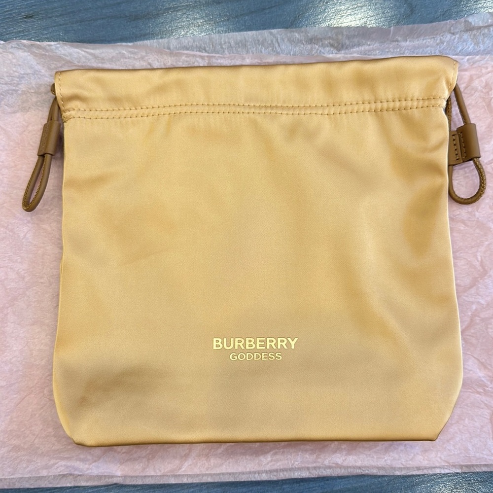 Burberry Goddess gold pouch